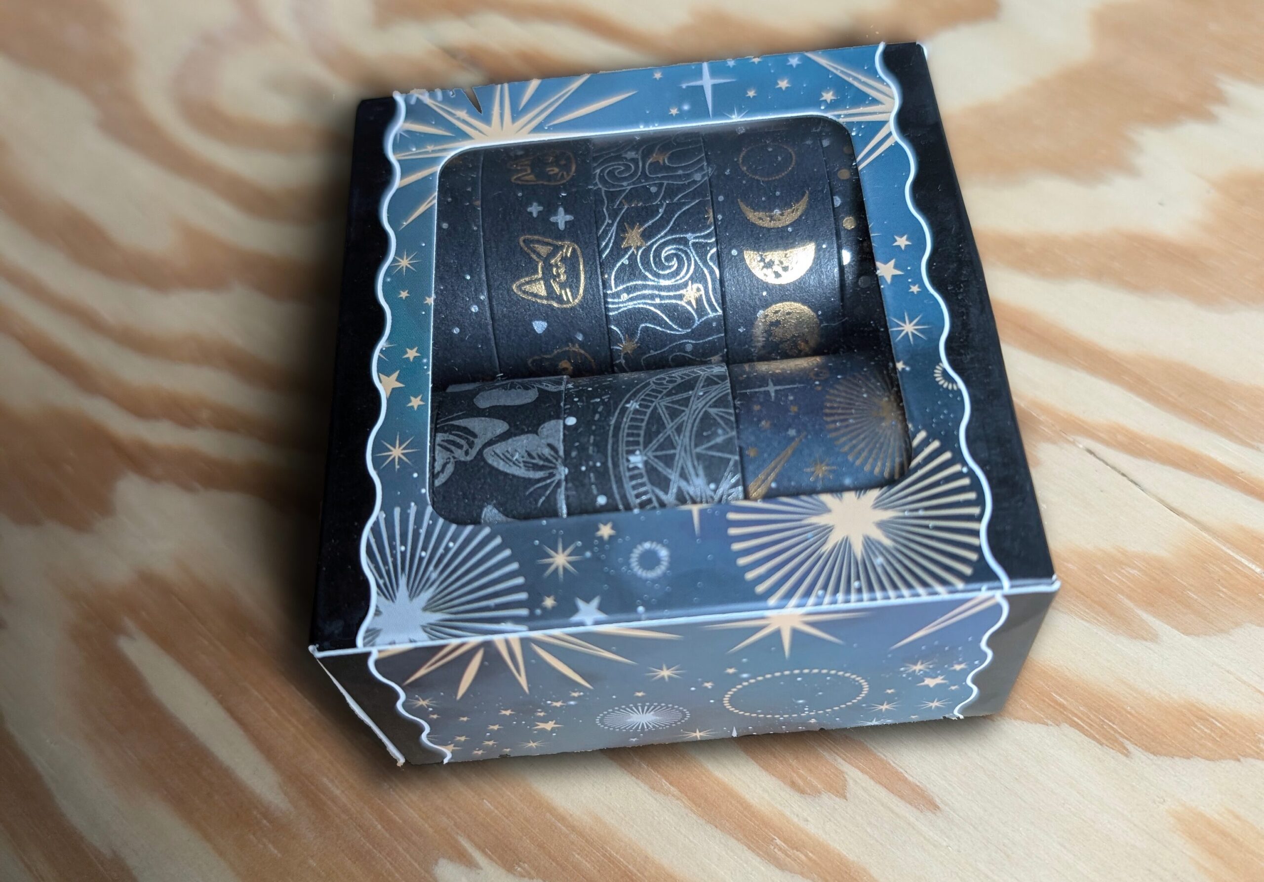 I mean it's a picture of washi tape and the background is a wooden thing that I use to put my feet on because my desk is too high and my chair doesn't go higher.